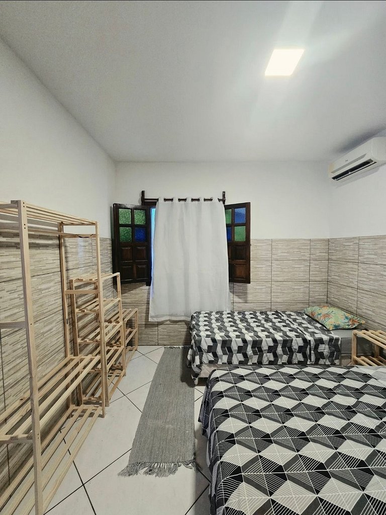 Casa branca com 3 dormitórios em Arraial