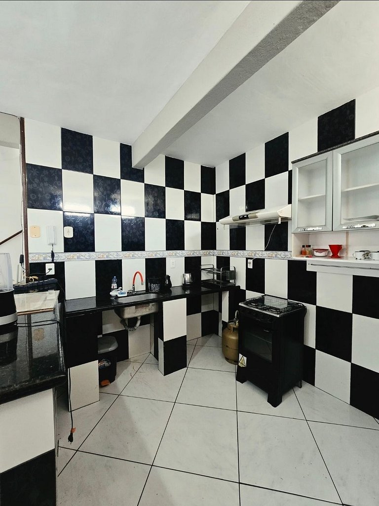 Casa branca com 3 dormitórios em Arraial